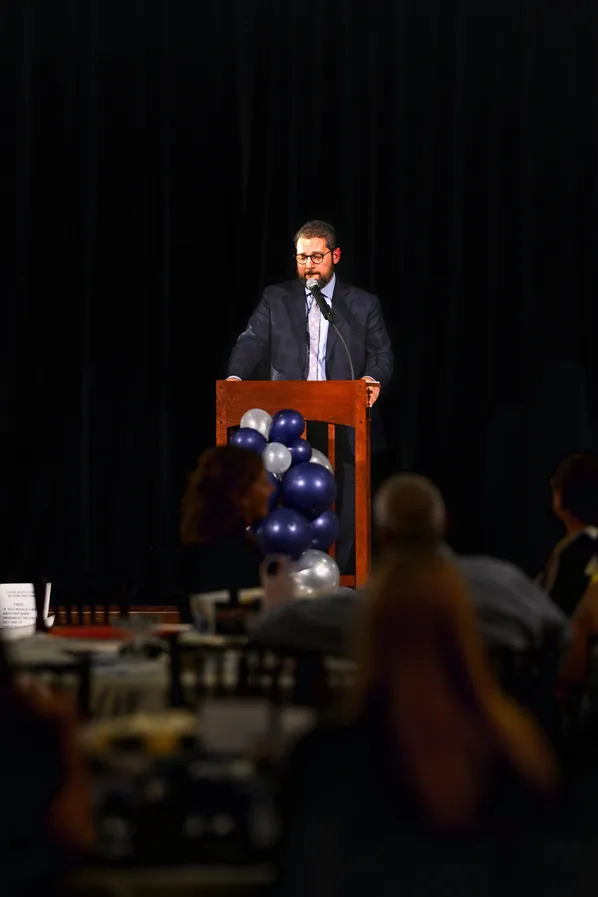 Speaker at the podium during an awards banquet